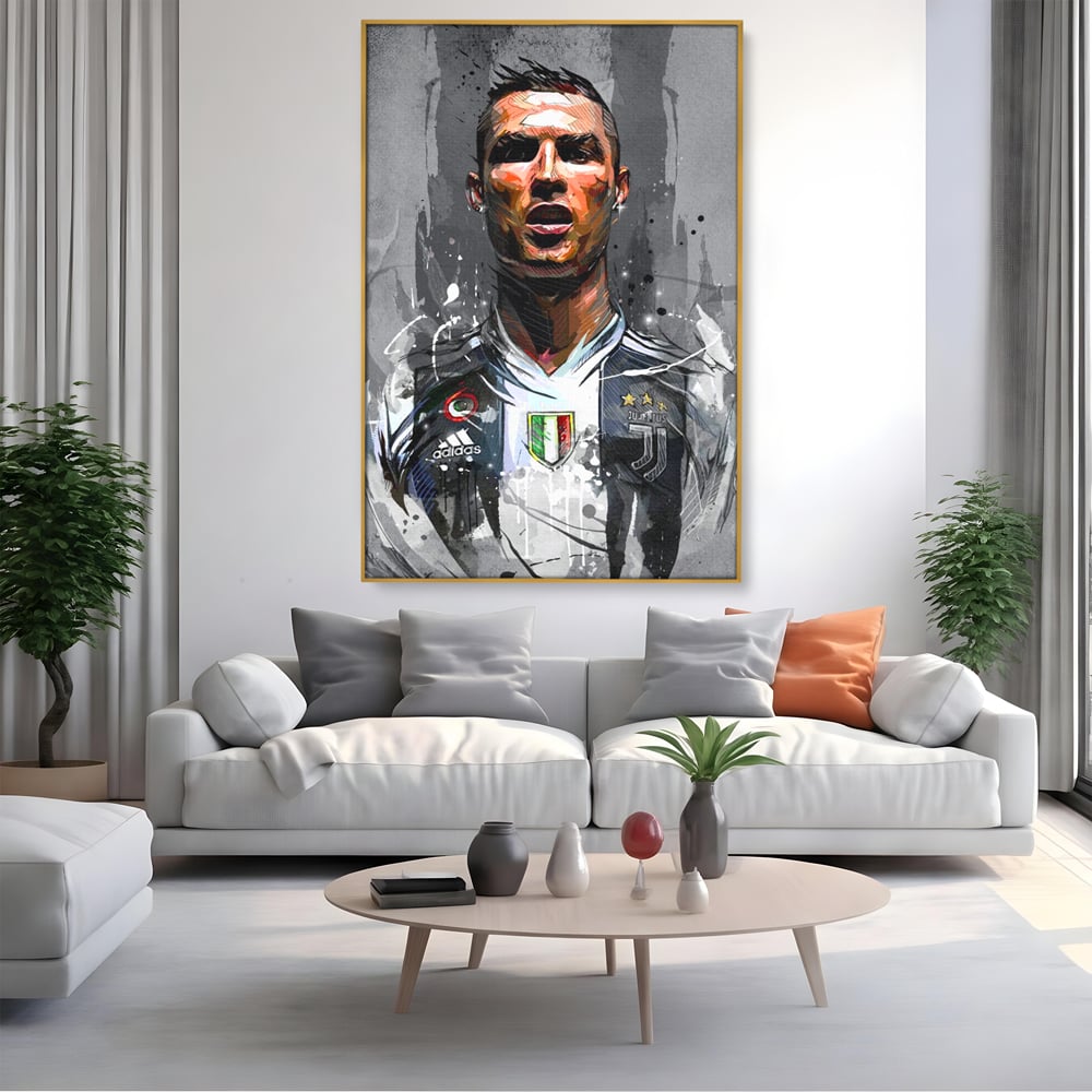 Tablou canvas cu tablou portret cristiano ronaldo juventus, in rama de aluminiu auriu, pe perete intr-un living