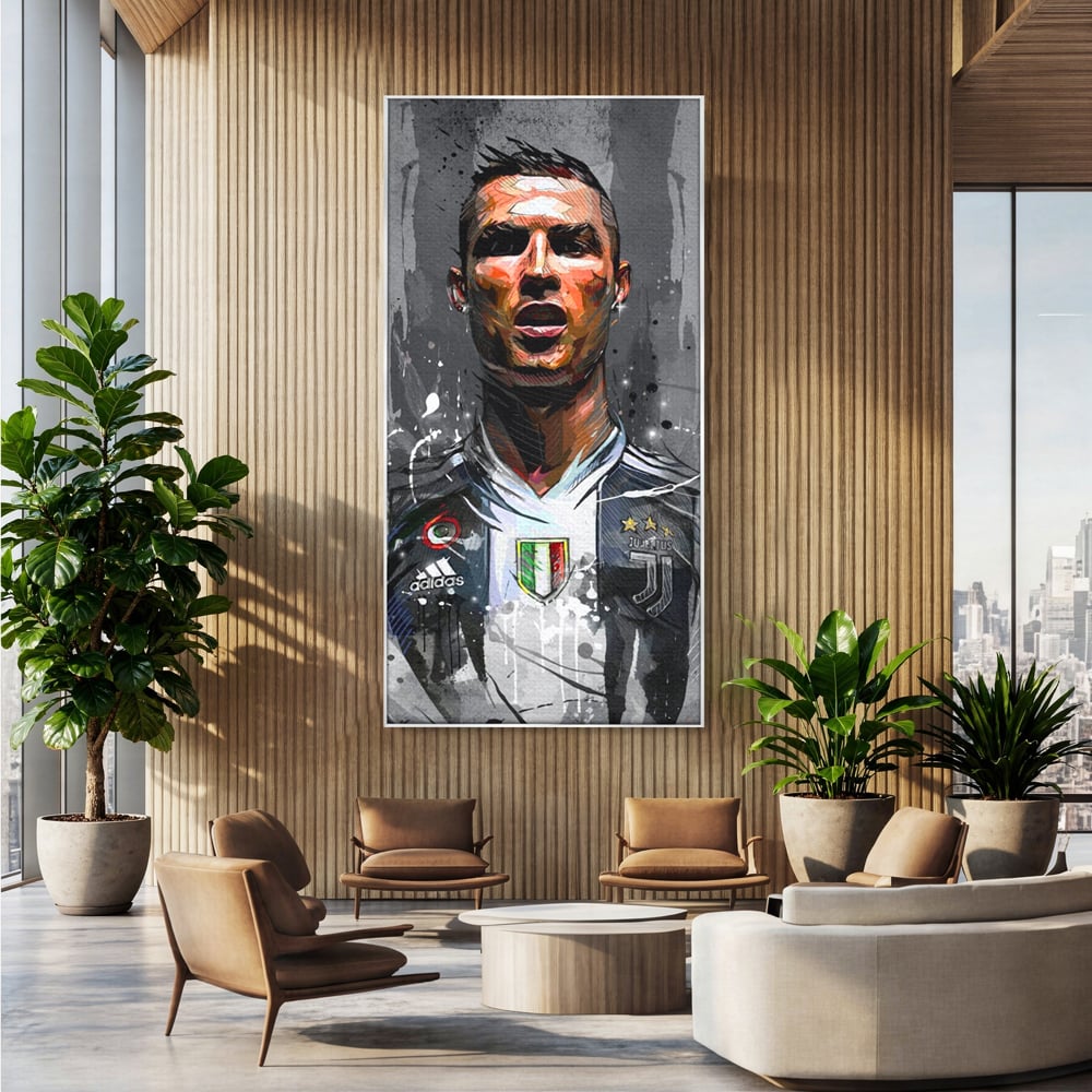 Tablou canvas cu tablou portret cristiano ronaldo juventus, in rama de aluminiu argintiu, pe perete intr-un birou