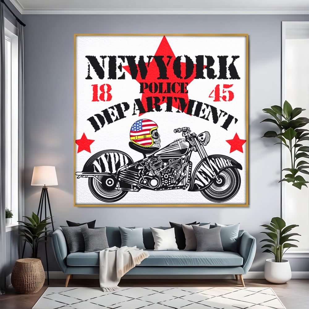 Tablou canvas cu tablou canvas cu motocicleta si craniu, in rama de aluminiu auriu, pe perete intr-un living