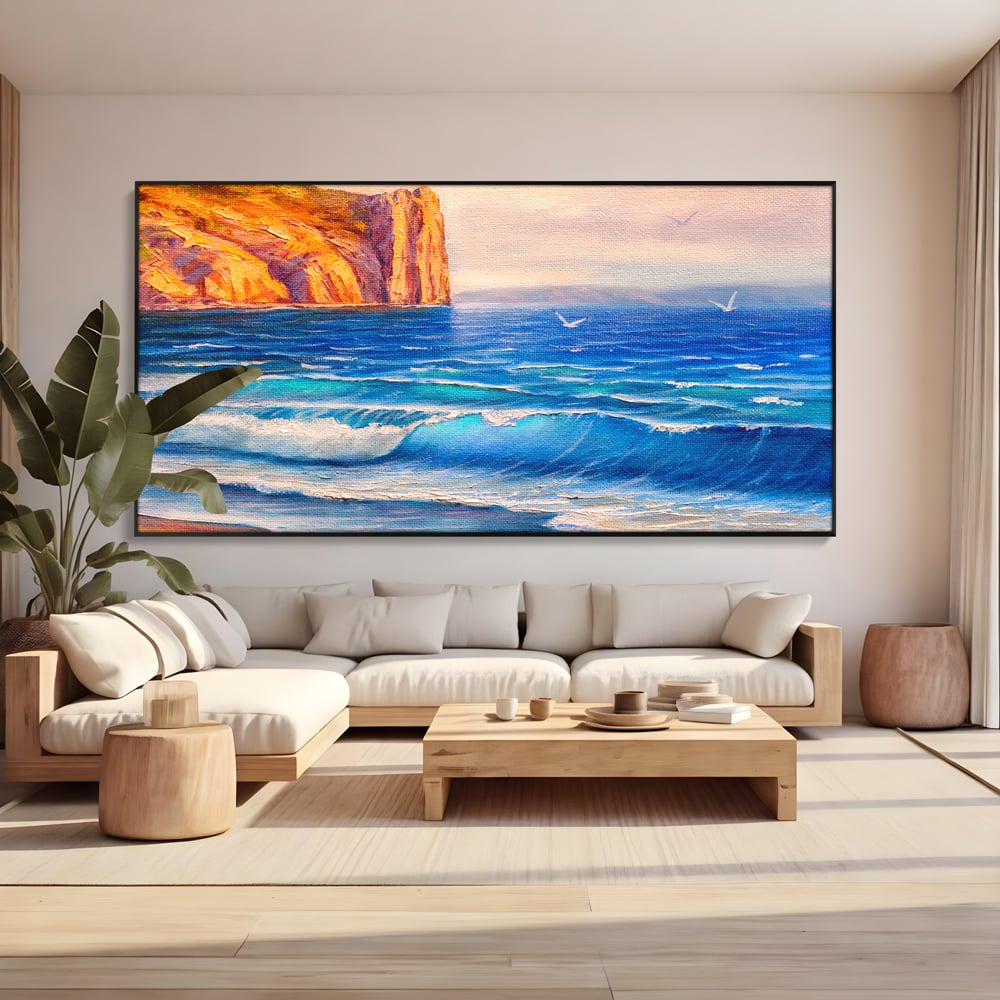 Tablou canvas cu pictura cu stanca pe malul marii, in rama de aluminiu negru, pe perete intr-un living