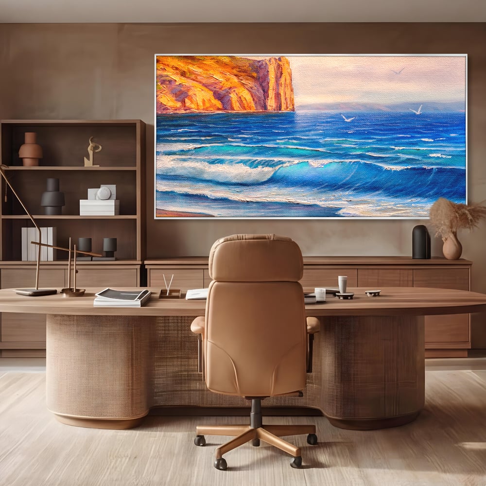 Tablou canvas cu pictura cu stanca pe malul marii, in rama de aluminiu argintiu, pe perete intr-un birou