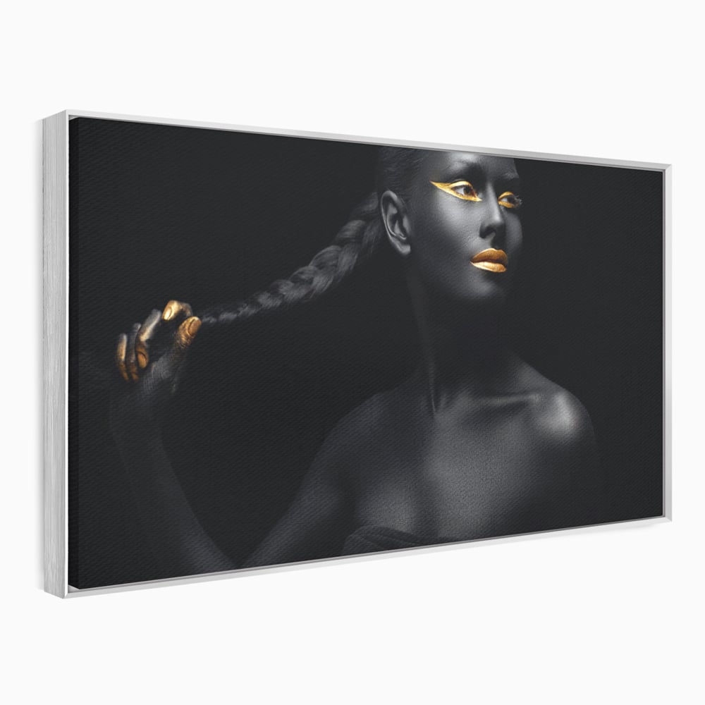 Tablou canvas cu tablou canvas cu femeie vopsita in negru si auriu, in rama de aluminiu argintiu