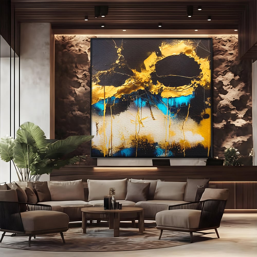 Tablou canvas cu pictura abstracta cu forme aurii si albastre, in rama de aluminiu negru, pe perete intr-un birou