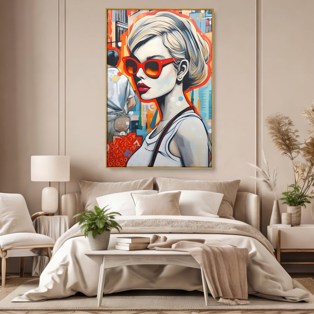 Tablou canvas cu tablou canvas cu portret stilizat de femeie, in rama de aluminiu auriu, pe perete intr-un dormitor