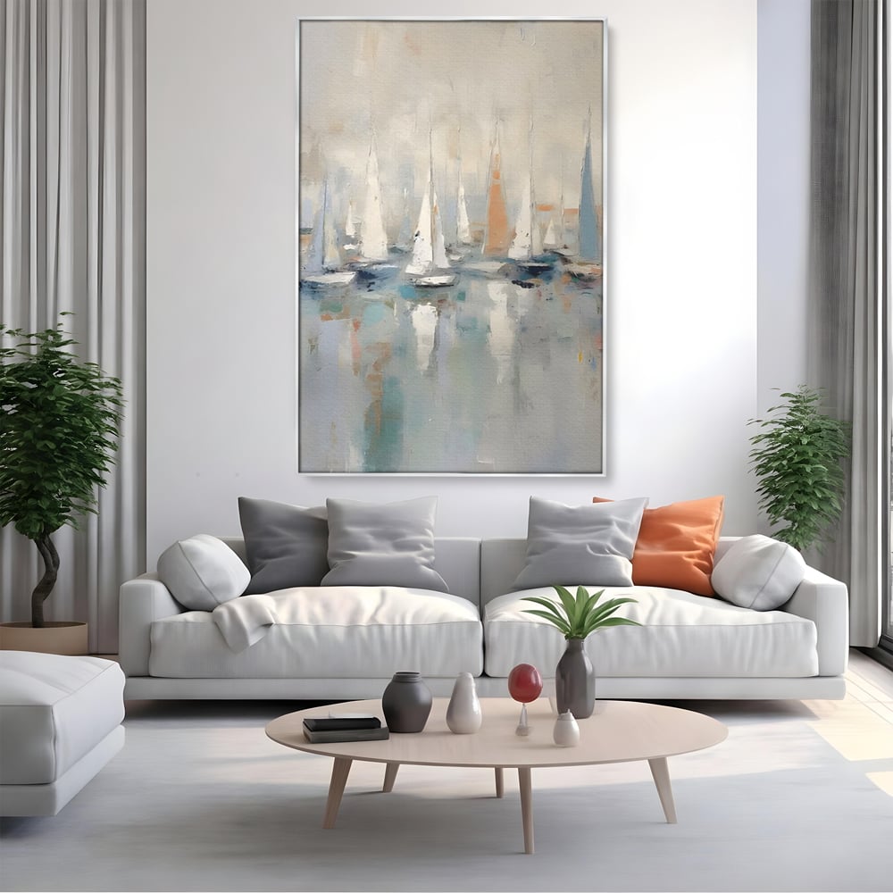 Tablou canvas cu pictura abstracta cu barci cu panze, in rama de aluminiu argintiu, pe perete intr-un living