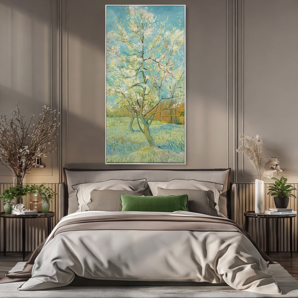 Tablou canvas cu pictura cu un copac inflorit primavara, in rama de aluminiu argintiu, pe perete intr-un dormitor