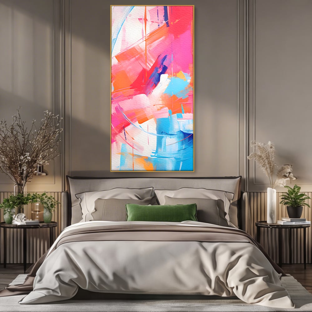 Tablou canvas cu pictura abstracta cu pete multicolore, in rama de aluminiu auriu, pe perete intr-un dormitor