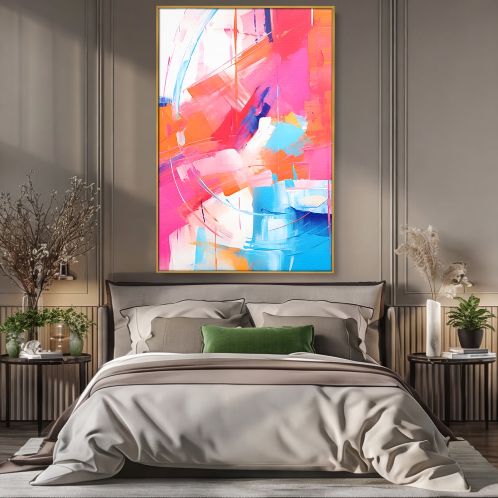 Tablou canvas cu pictura abstracta cu pete multicolore, in rama de aluminiu auriu, pe perete intr-un dormitor