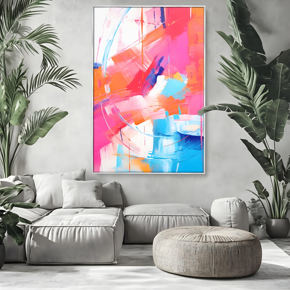 Tablou canvas cu pictura abstracta cu pete multicolore, in rama de aluminiu argintiu, pe perete intr-un living