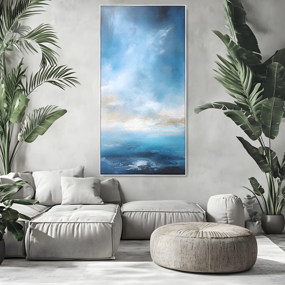 Tablou canvas cu tablou pictura abstracta cer si mare, in rama de aluminiu argintiu, pe perete intr-un living
