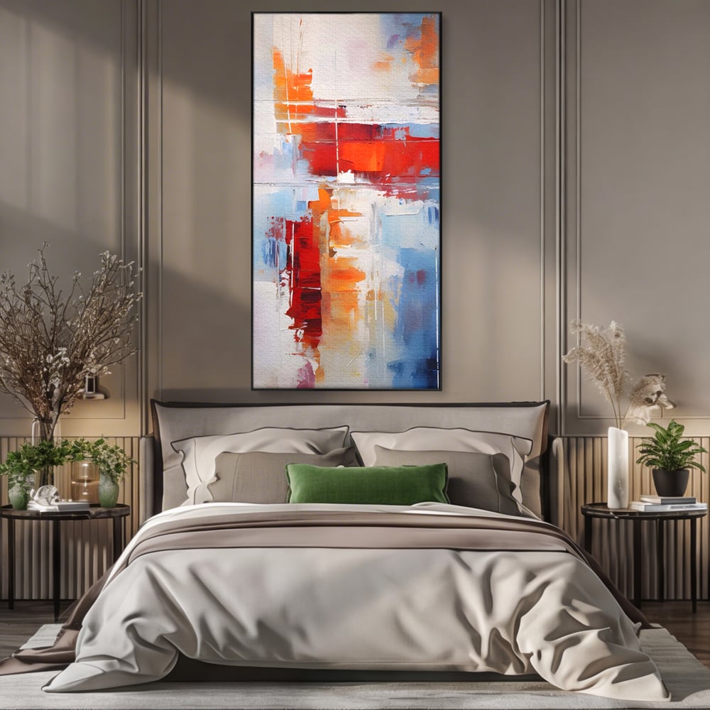 Tablou canvas cu pictura abstracta cu rosu si albastru, in rama de aluminiu negru, pe perete intr-un dormitor
