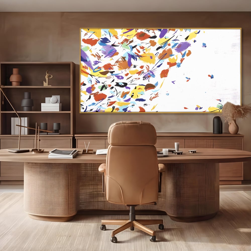 Tablou canvas cu pictura abstracta cu frunze colorate, in rama de aluminiu auriu, pe perete intr-un birou