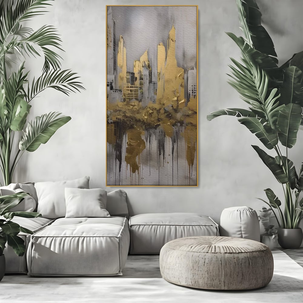 Tablou canvas cu tablou canvas cu zgarie-nori aurii, in rama de aluminiu auriu, pe perete intr-un living
