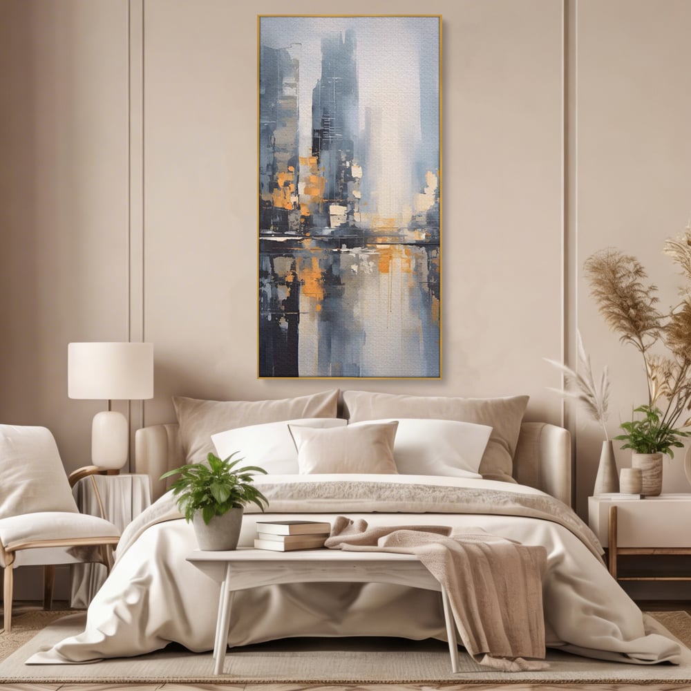 Tablou canvas cu pictura abstracta cu cladiri si reflexii, in rama de aluminiu auriu, pe perete intr-un dormitor