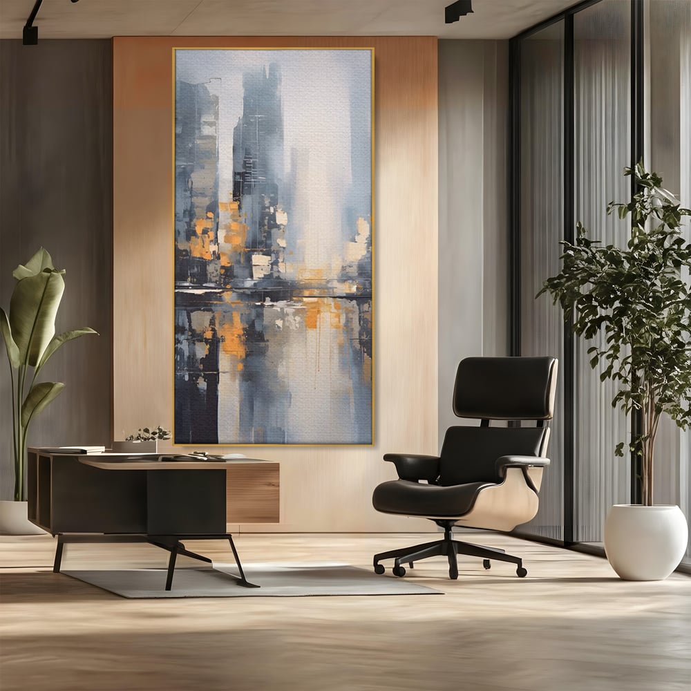 Tablou canvas cu pictura abstracta cu cladiri si reflexii, in rama de aluminiu auriu, pe perete intr-un birou