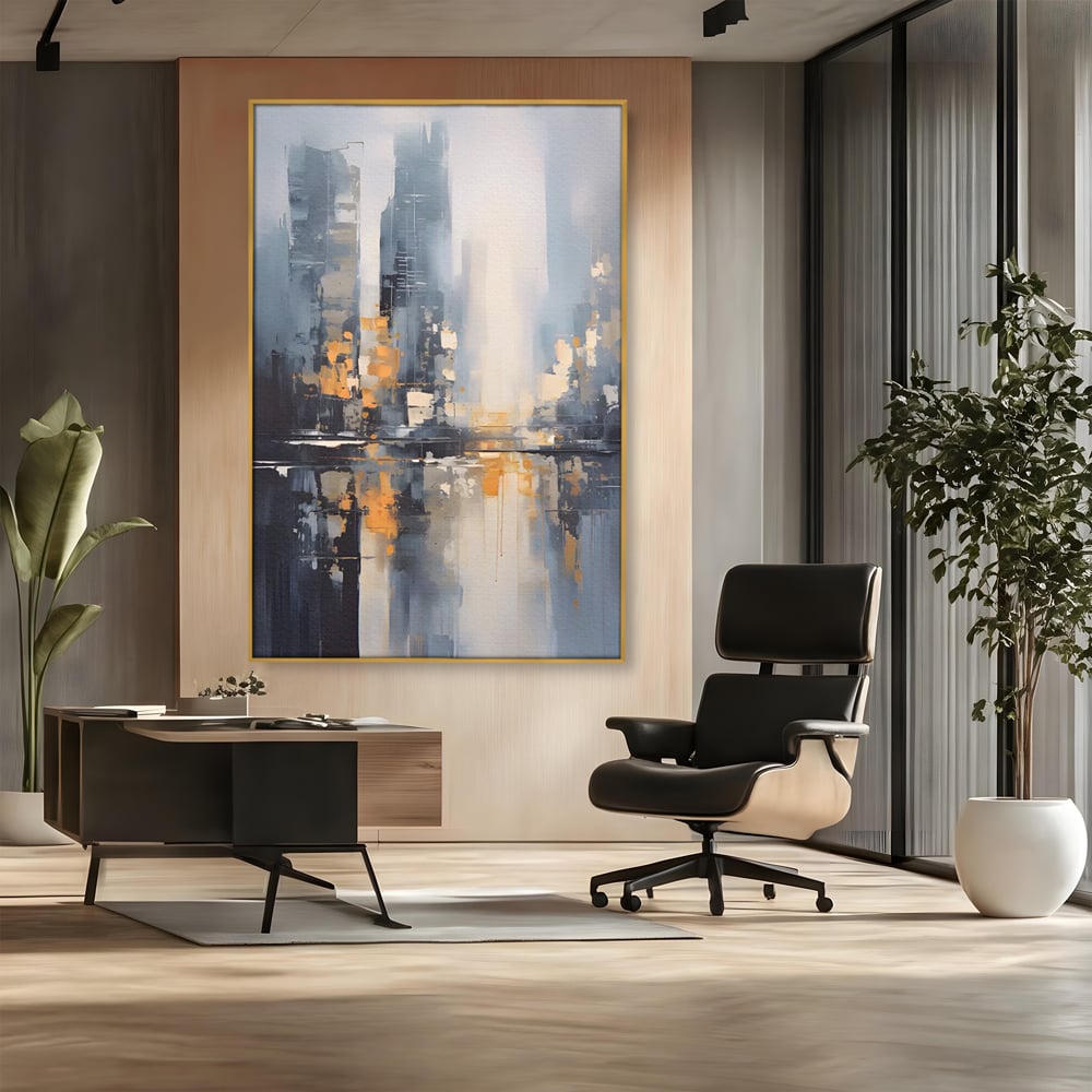Tablou canvas cu pictura abstracta cu cladiri si reflexii, in rama de aluminiu auriu, pe perete intr-un birou