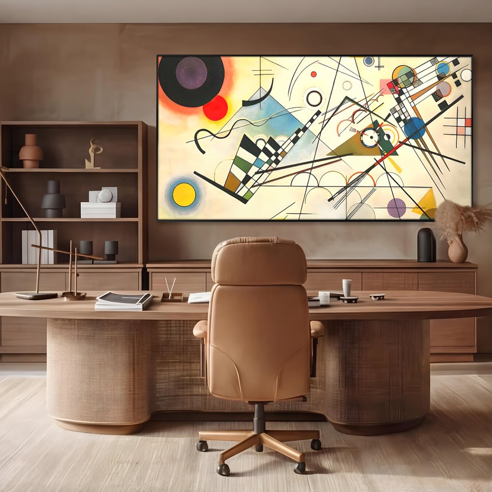 Tablou canvas cu pictura abstracta cu forme geometrice colorate, in rama de aluminiu negru, pe perete intr-un birou