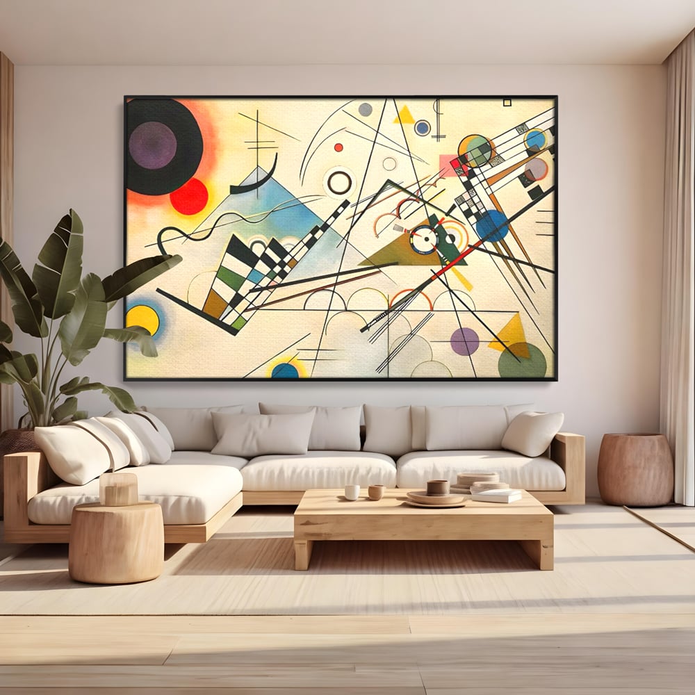 Tablou canvas cu pictura abstracta cu forme geometrice colorate, in rama de aluminiu negru, pe perete intr-un living