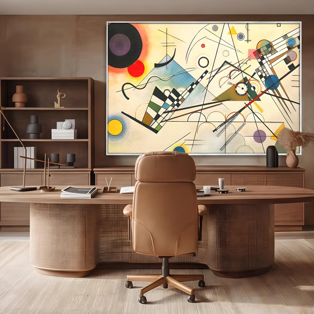 Tablou canvas cu pictura abstracta cu forme geometrice colorate, in rama de aluminiu argintiu, pe perete intr-un birou