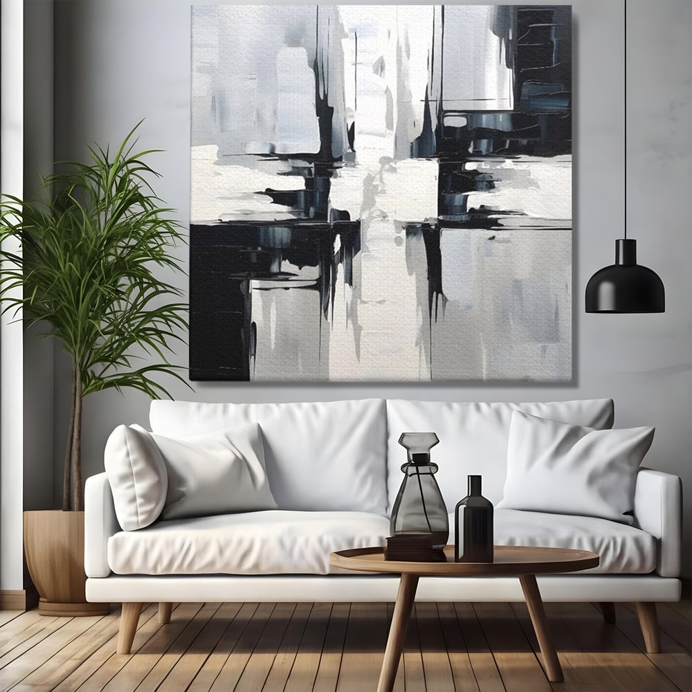 Tablou canvas cu pictura abstracta alb-negru, fara rama, pe sasiu de lemn, pe perete intr-un living