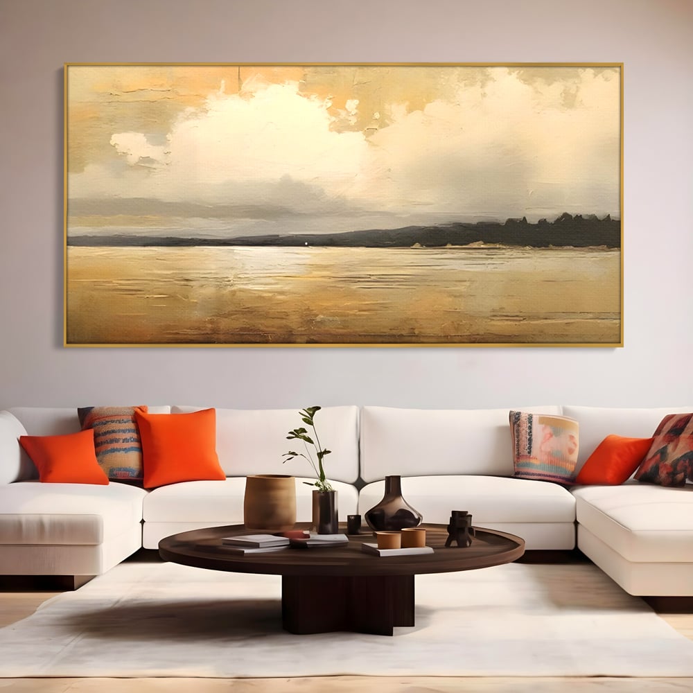 Tablou canvas cu pictura orizontala cu apus pe lac, in rama de aluminiu auriu, pe perete intr-un living