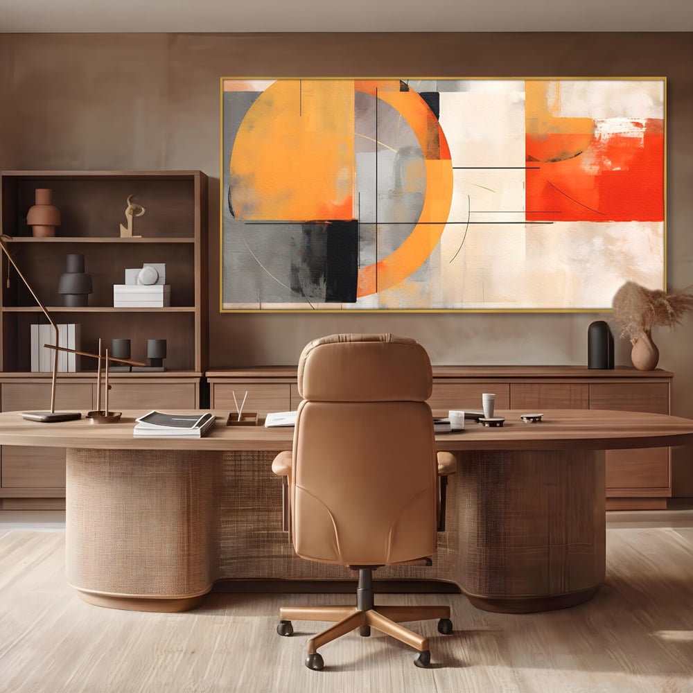 Tablou canvas cu pictura abstracta cu cerc galben, in rama de aluminiu auriu, pe perete intr-un birou