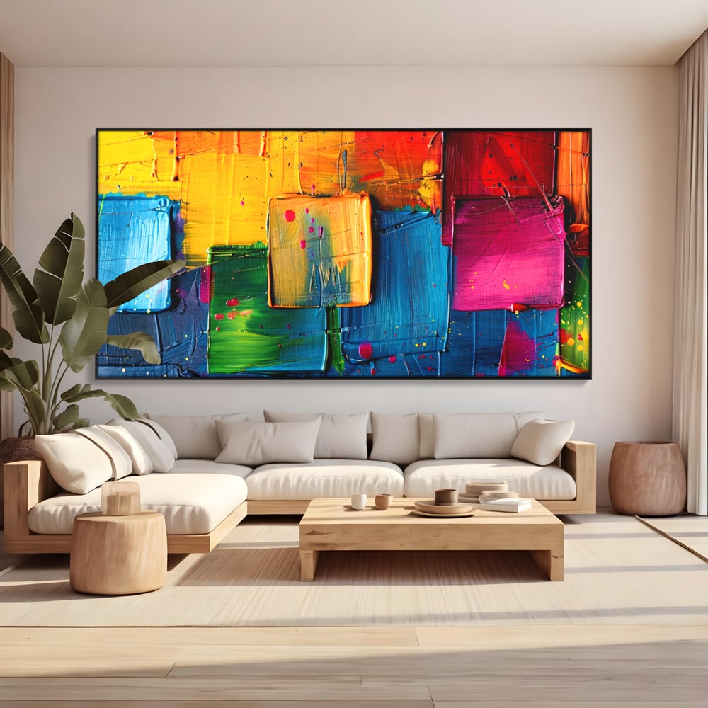 Tablou canvas cu pictura abstracta cu patrate colorate in relief, in rama de aluminiu negru, pe perete intr-un living