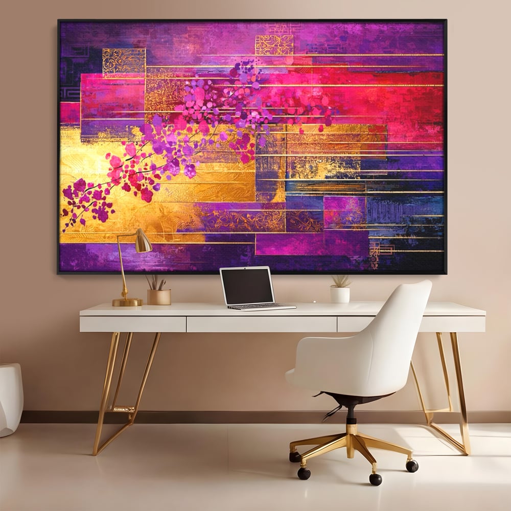 Tablou canvas cu pictura abstracta cu flori roz si linii aurii, in rama de aluminiu negru, pe perete intr-un birou