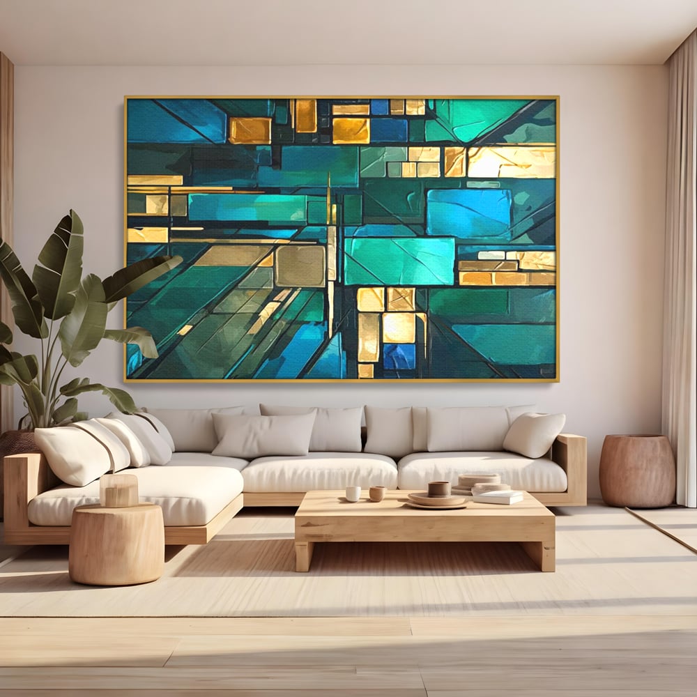 Tablou canvas cu tablou abstract geometric in nuante de albastru, in rama de aluminiu auriu, pe perete intr-un living