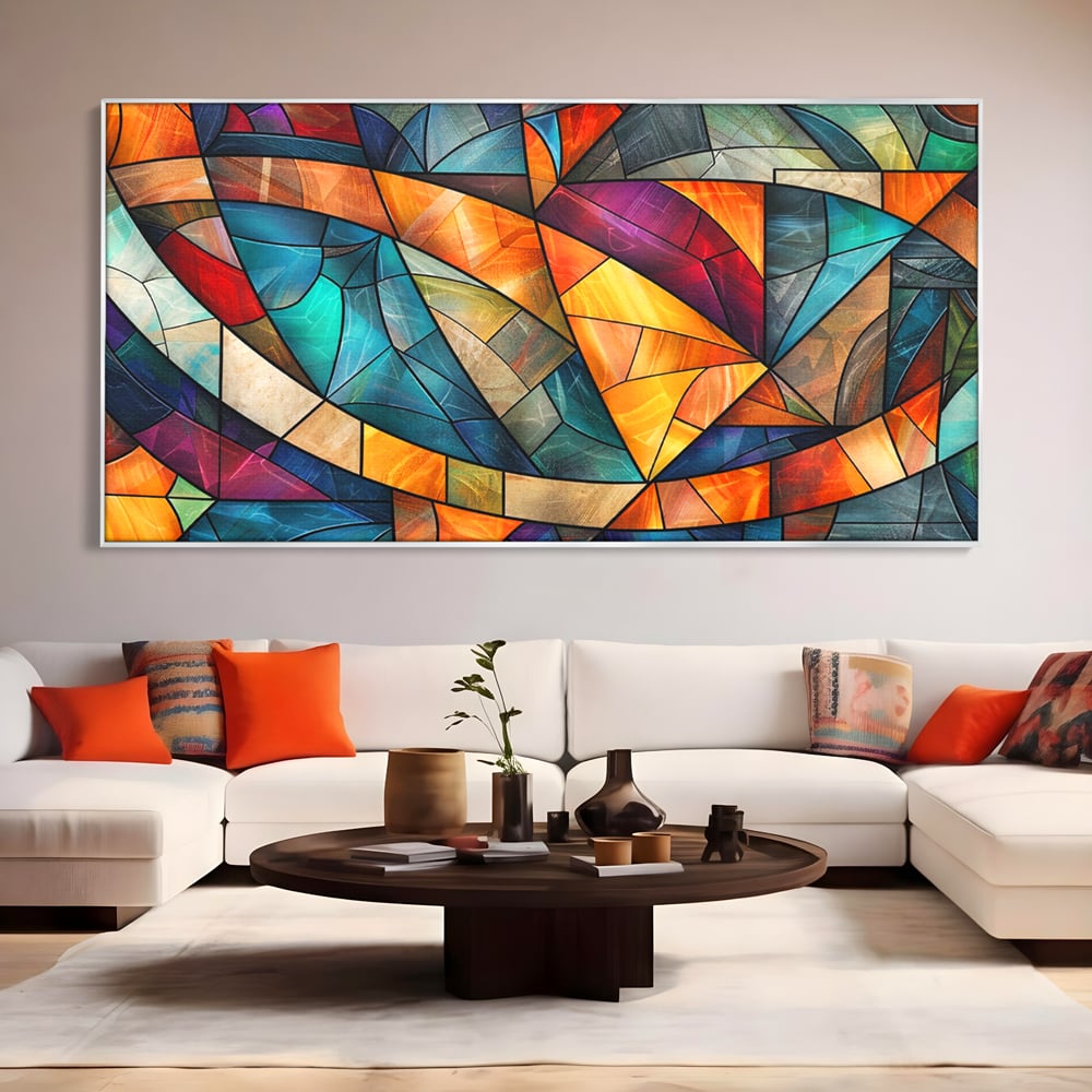 Tablou canvas cu tablou canvas cu mozaic geometric colorat, in rama de aluminiu argintiu, pe perete intr-un living