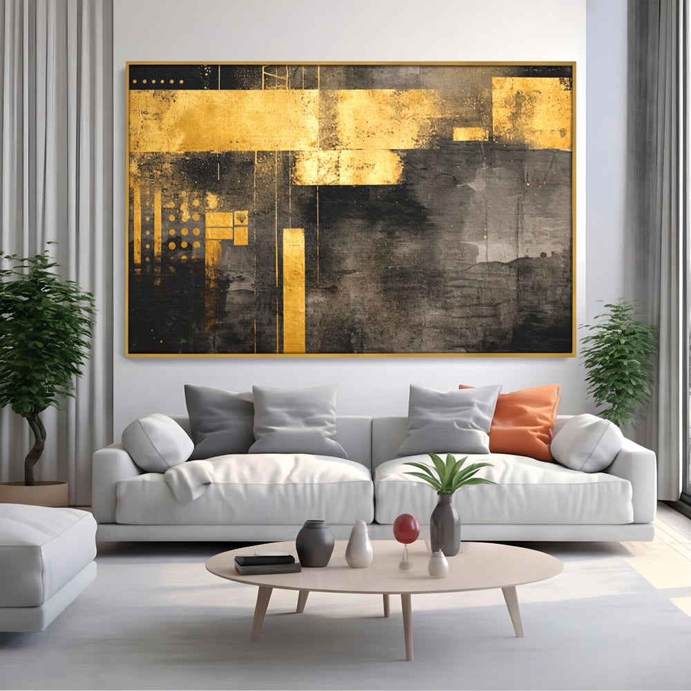 Tablou canvas cu pictura abstracta cu forme geometrice aurii, in rama de aluminiu auriu, pe perete intr-un living