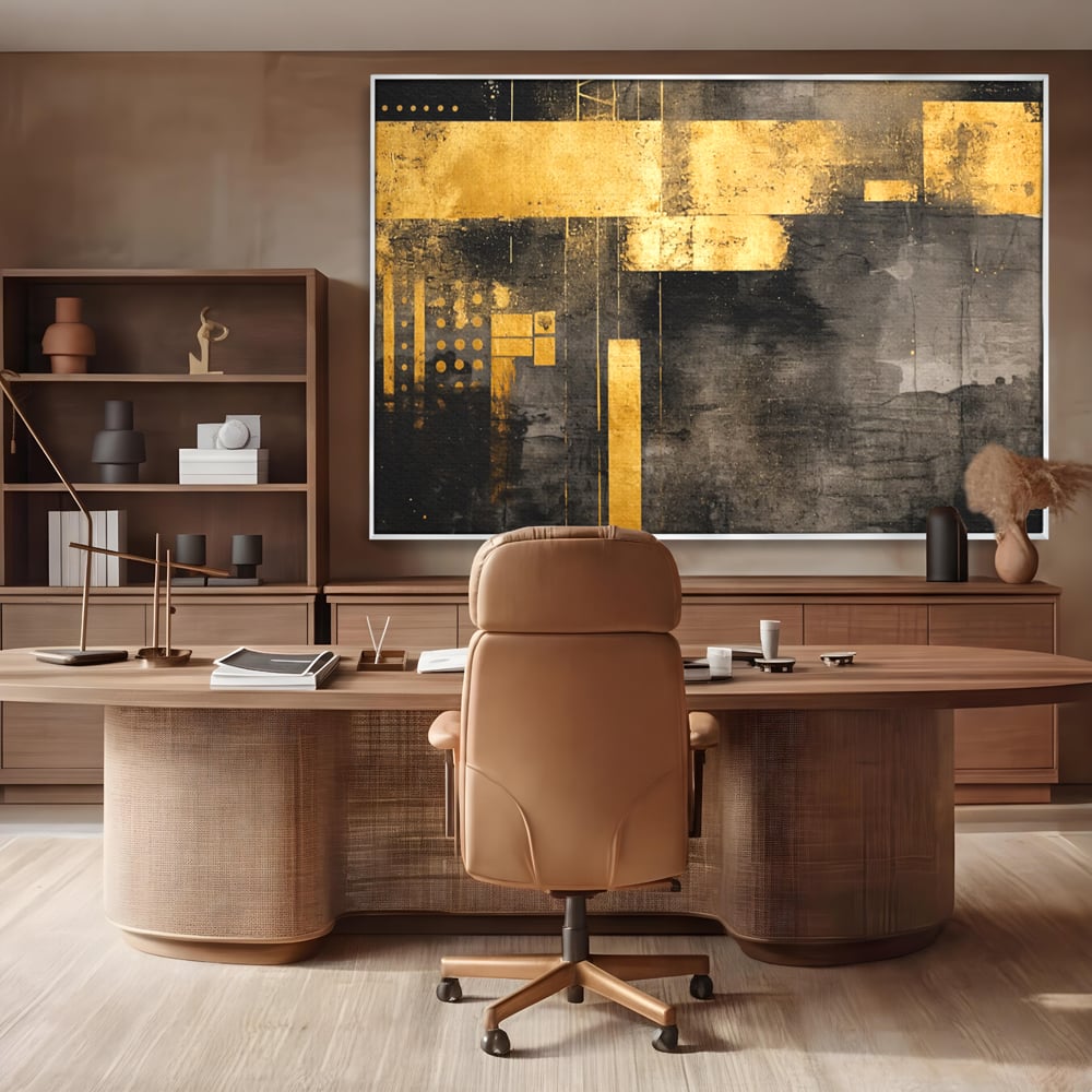 Tablou canvas cu pictura abstracta cu forme geometrice aurii, in rama de aluminiu argintiu, pe perete intr-un birou