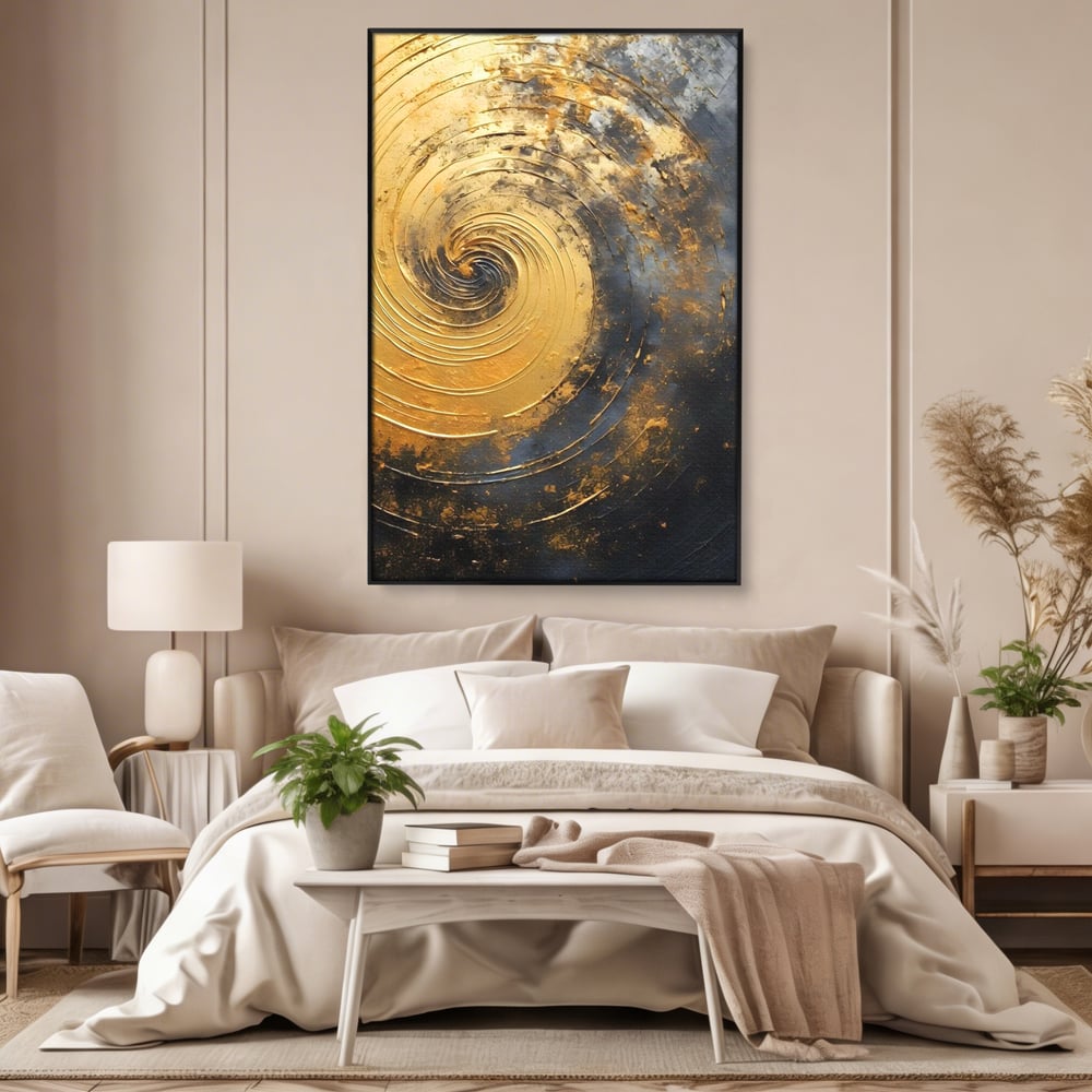 Tablou canvas cu pictura abstracta cu spirala aurie, in rama de aluminiu negru, pe perete intr-un dormitor