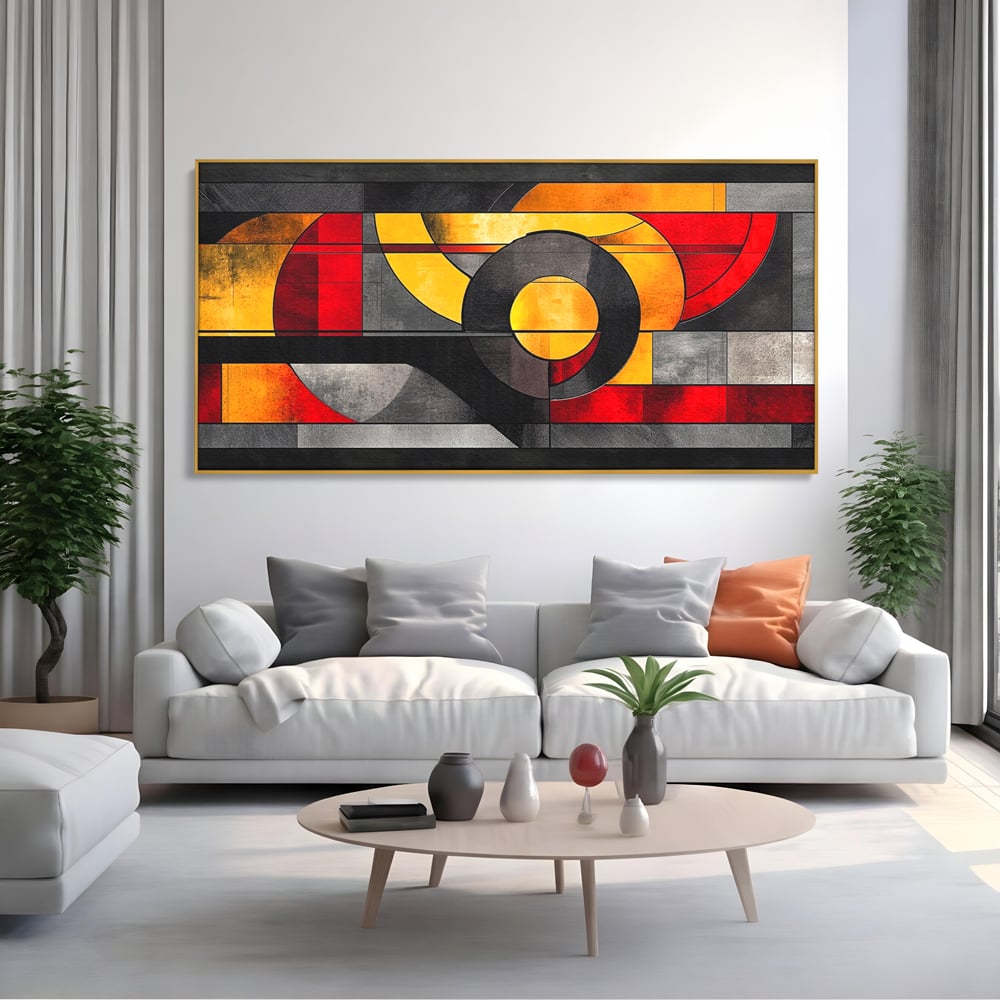 Tablou canvas cu tablou canvas cu forme geometrice abstracte, in rama de aluminiu auriu, pe perete intr-un living