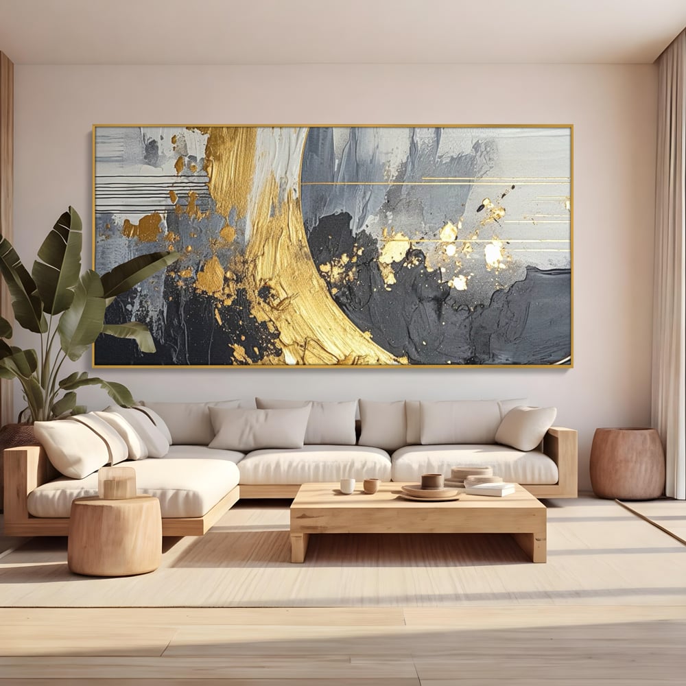 Tablou canvas cu pictura abstracta cu arc aurit si texturi gri, in rama de aluminiu auriu, pe perete intr-un living