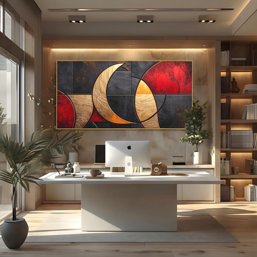 Tablou canvas cu tablou canvas cu forme geometrice aurii si rosii, in rama de aluminiu auriu, pe perete intr-un birou