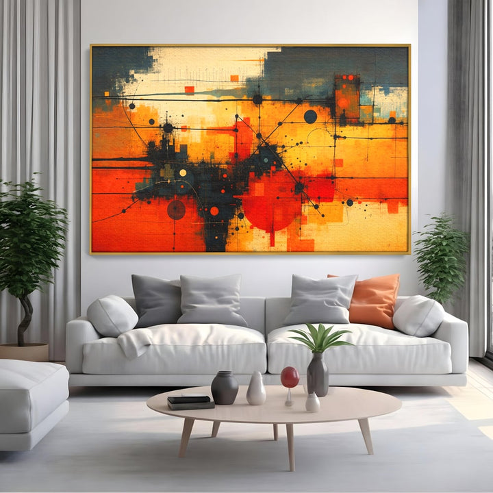 Tablou canvas cu tablou canvas cu compozitie abstracta geometrica, in rama de aluminiu auriu, pe perete intr-un living