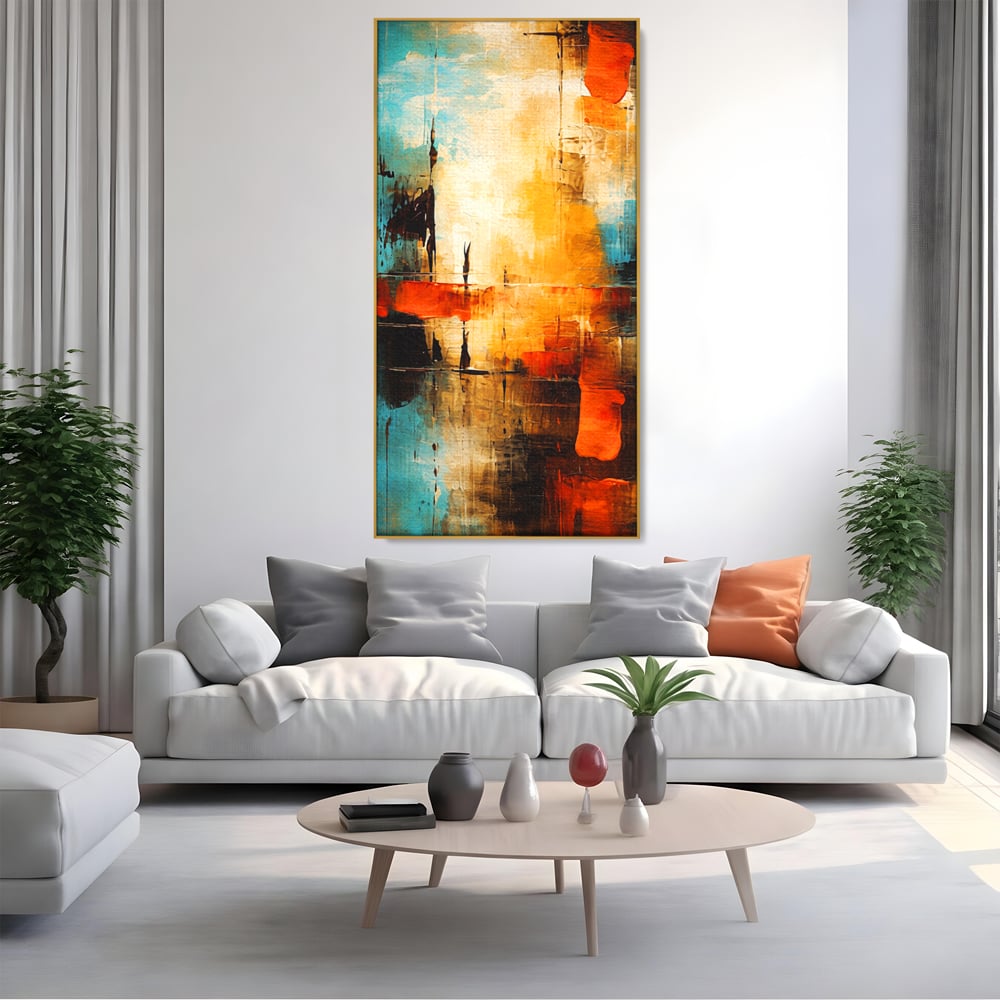Tablou canvas cu pictura abstracta cu portocaliu si albastru, in rama de aluminiu auriu, pe perete intr-un living