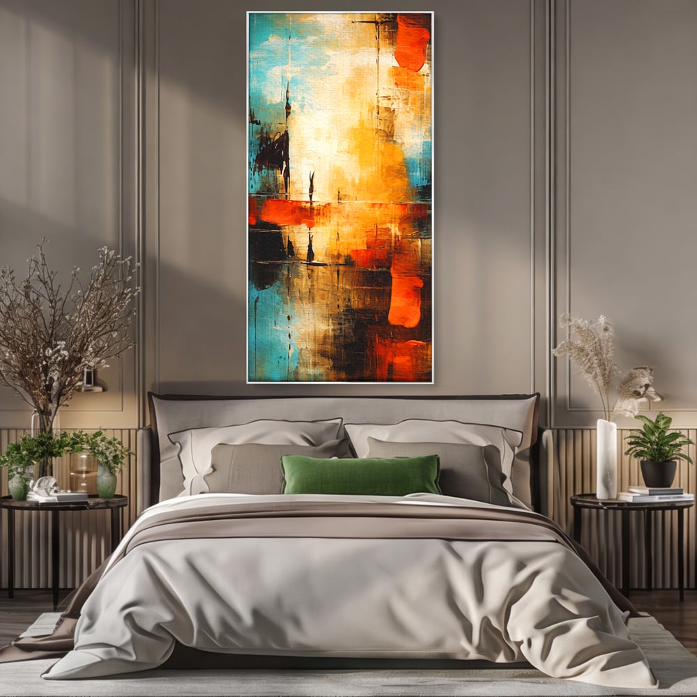 Tablou canvas cu pictura abstracta cu portocaliu si albastru, in rama de aluminiu argintiu, pe perete intr-un dormitor