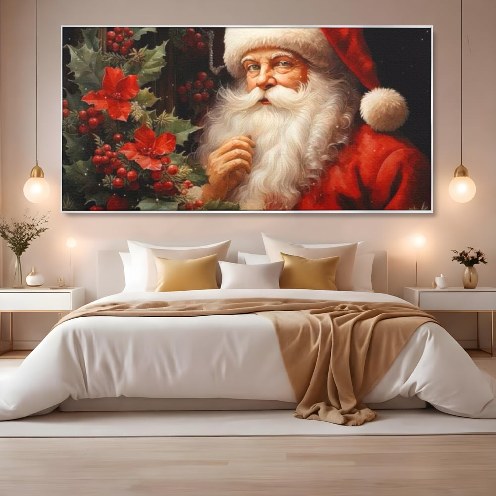 Tablou canvas cu tablou canvas cu mos craciun, in rama de aluminiu argintiu, pe perete intr-un dormitor