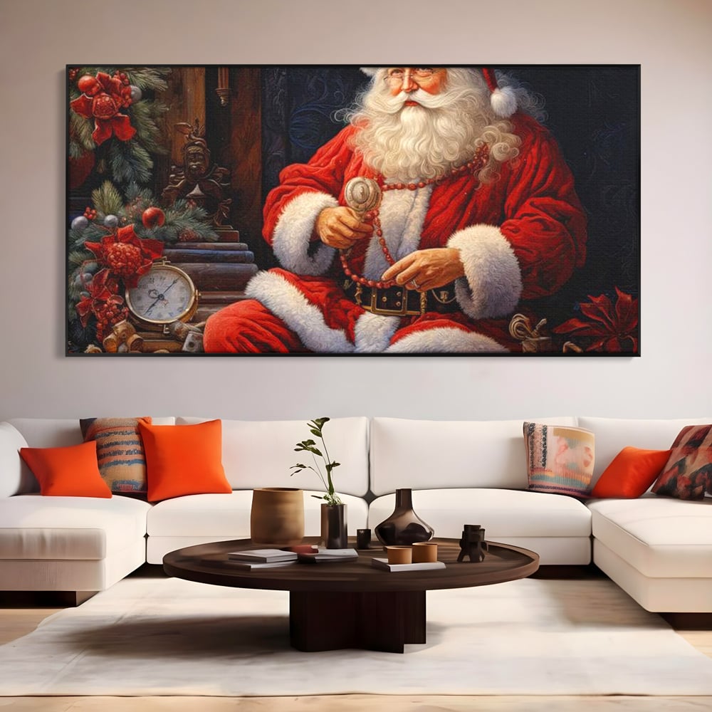 Tablou canvas cu mos craciun cu haina rosie, in rama de aluminiu negru, pe perete intr-un living