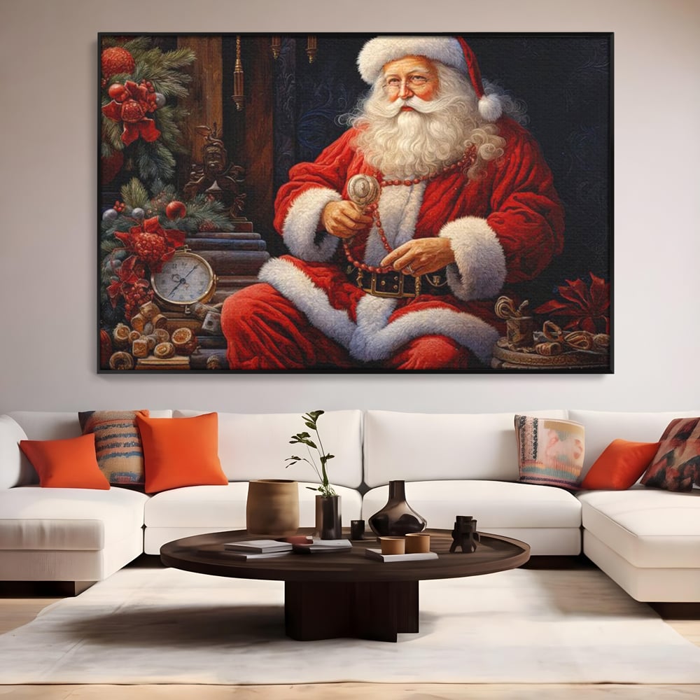 Tablou canvas cu mos craciun cu haina rosie, in rama de aluminiu negru, pe perete intr-un living