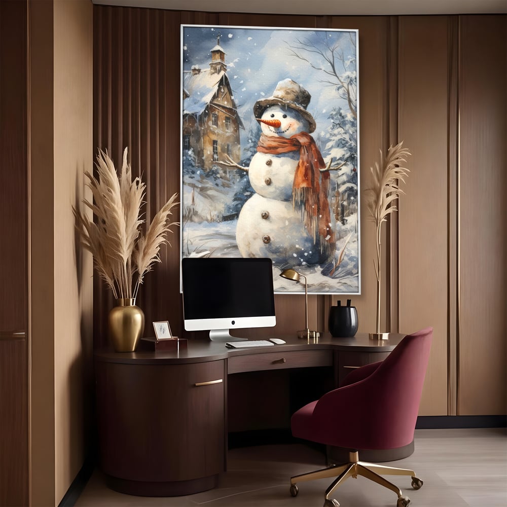 Tablou canvas cu tablou canvas cu om de zapada, in rama de aluminiu argintiu, pe perete intr-un birou