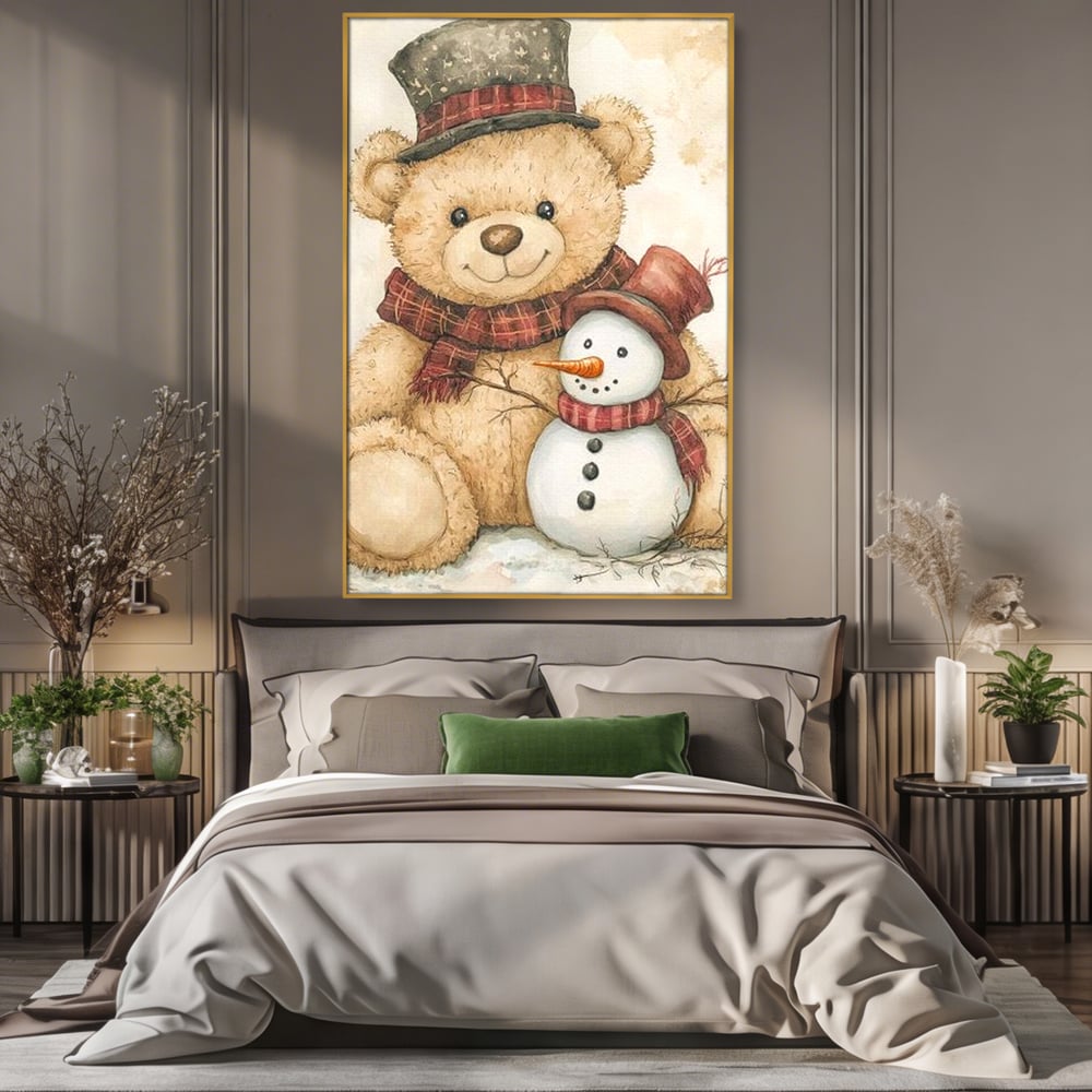 Tablou canvas cu ilustratie cu ursulet si om de zapada, in rama de aluminiu auriu, pe perete intr-un dormitor