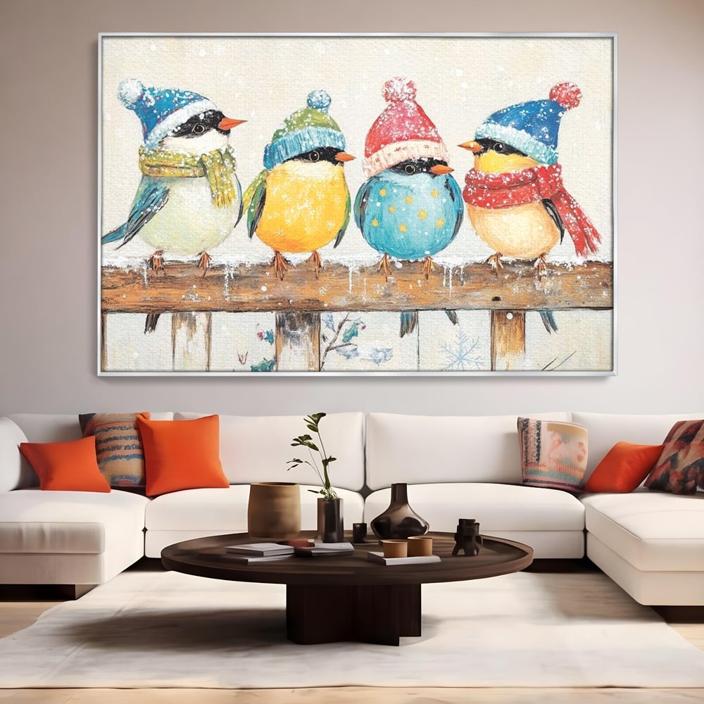 Tablou canvas cu tablou canvas cu vrabiute colorate in iarna, in rama de aluminiu argintiu, pe perete intr-un living