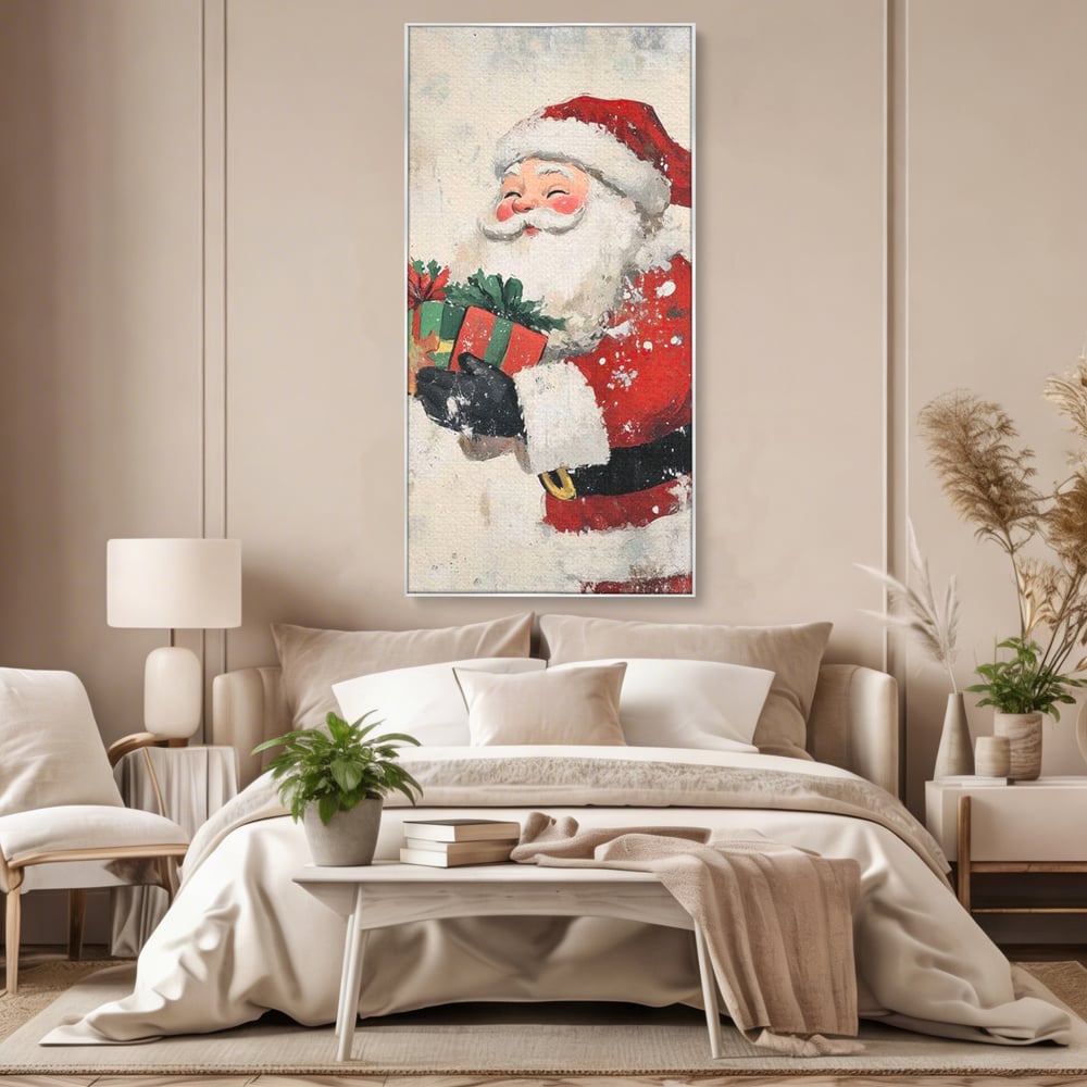 Tablou canvas cu ilustratie vintage cu mos craciun, in rama de aluminiu argintiu, pe perete intr-un dormitor