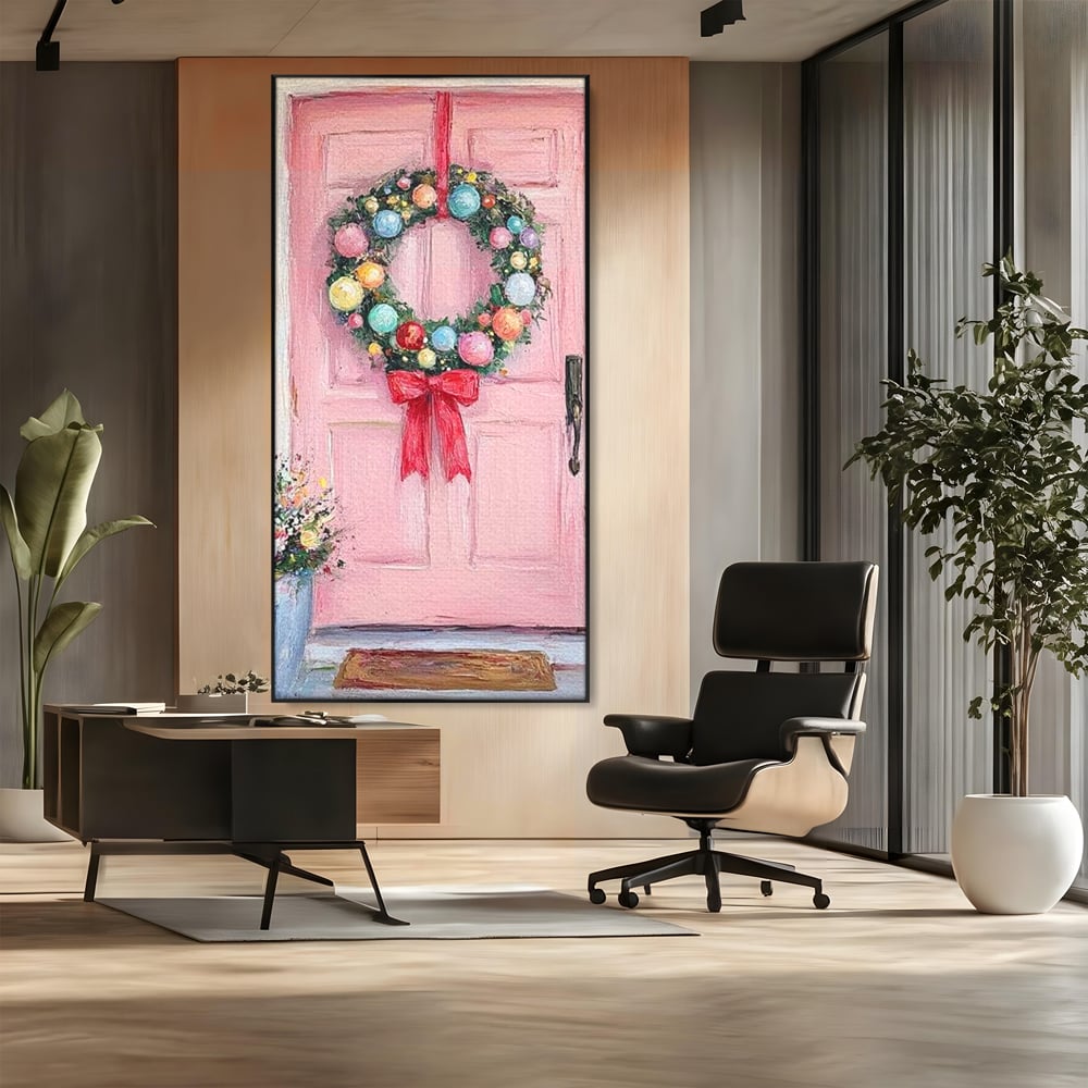Tablou canvas cu pictura cu usa roz si coronita de craciun, in rama de aluminiu negru, pe perete intr-un birou