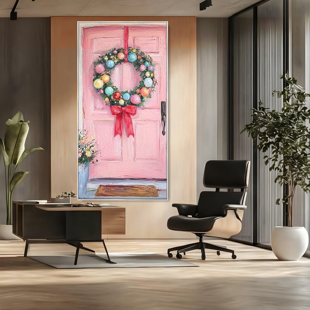 Tablou canvas cu pictura cu usa roz si coronita de craciun, in rama de aluminiu argintiu, pe perete intr-un birou