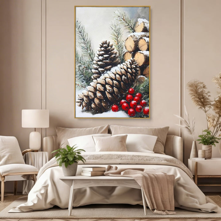 Tablou canvas cu pictura cu conuri de brad si bobite rosii, in rama de aluminiu auriu, pe perete intr-un dormitor