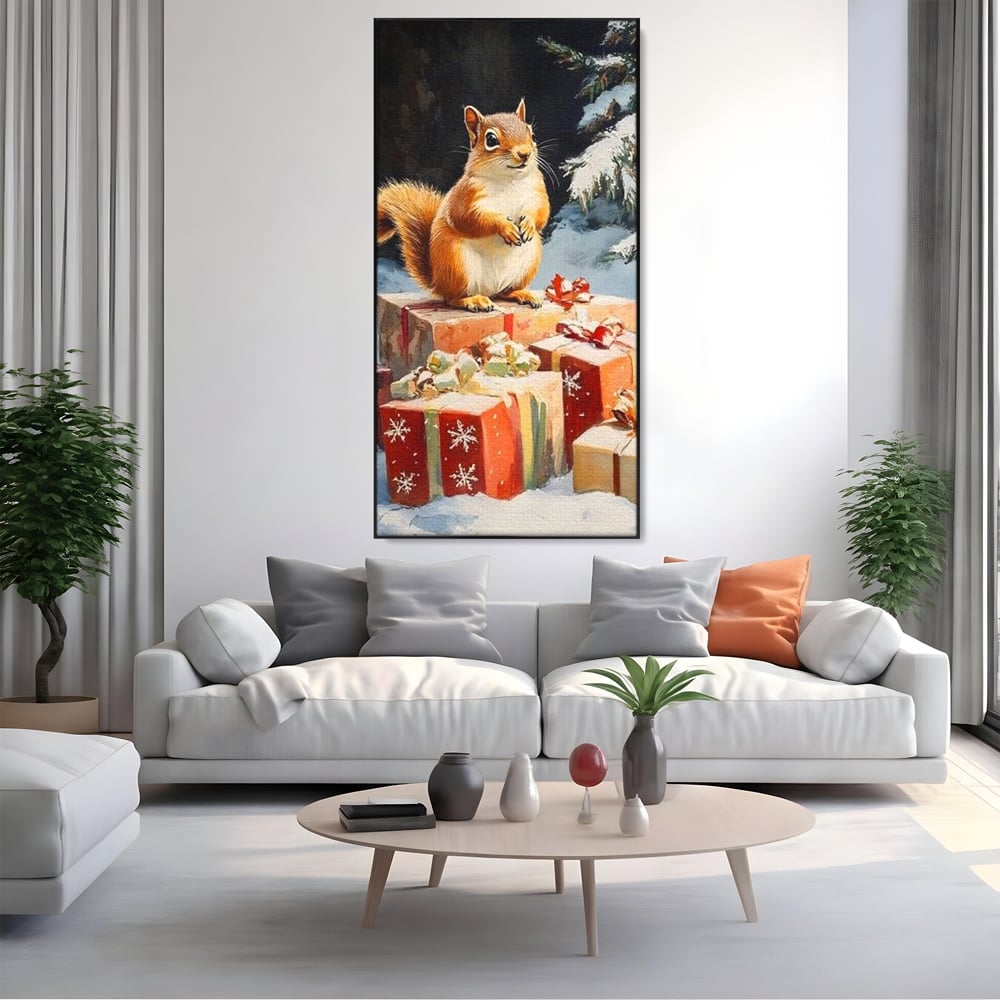 Tablou canvas cu tablou canvas cu veverita si cadouri de iarna, in rama de aluminiu negru, pe perete intr-un living
